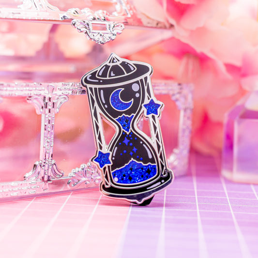 Blue Moon - cosmic glittering sand hourglass enamel pin